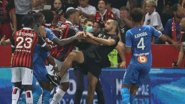 Nice 1-0 Marseille: Match abandoned after fans storm pitch