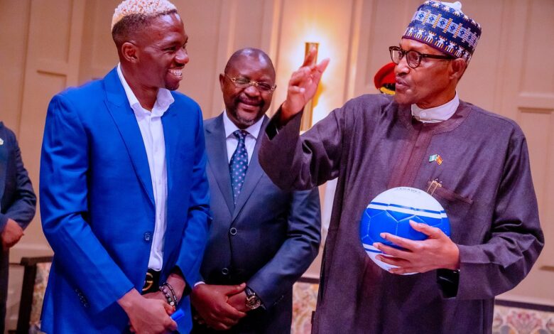 Super Eagles star, Omeruo presents signed jersey, ball to Buhari in Spain