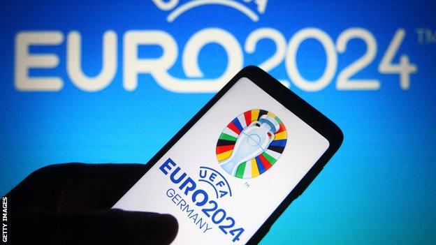An electronic tablet bearing the logo of Euro 2024
