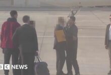 The moment Brittney Griner and Viktor Bout cross on airport tarmac